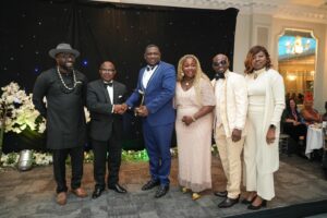 George Owen Received (EPRA UK 2025. Leadership Excellence Coaching Award for Life Transformation).) Presented by Dr. Boma Douglass